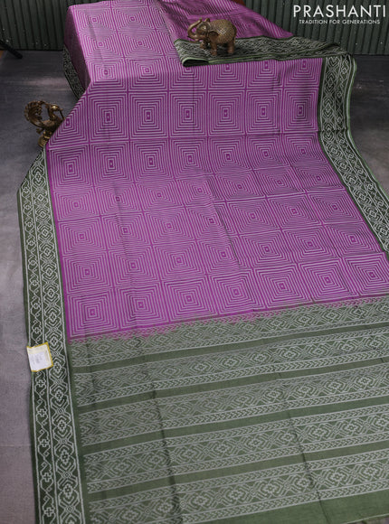 Sambalpuri semi silk saree purple and sap green with allover geometric ikat weaves and thread woven border