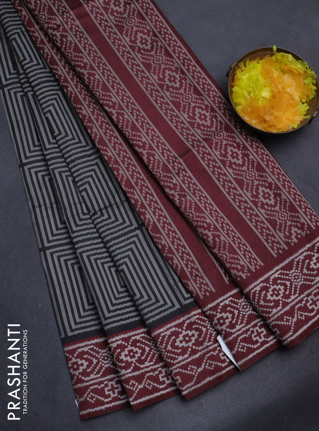 Sambalpuri semi silk saree black and deep maroon with allover geometric ikat weaves and thread woven border