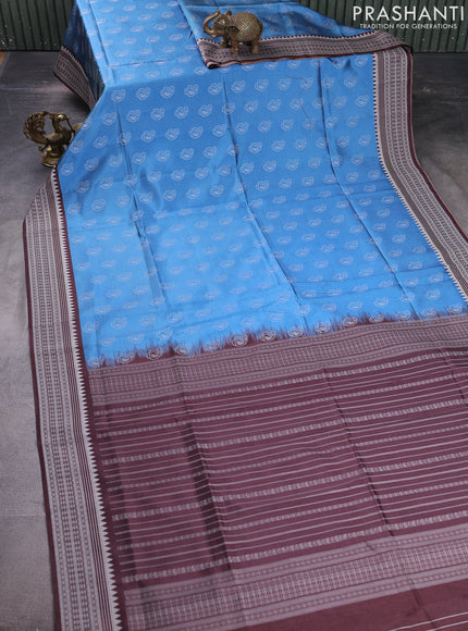 Sambalpuri semi silk saree light blue and brown with paisley butta weaves and thread woven border