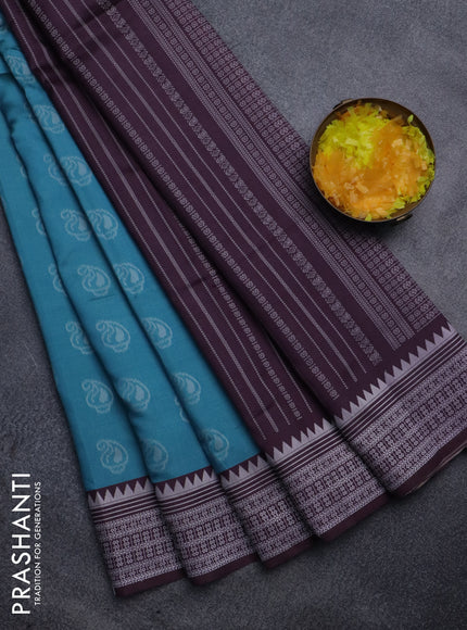 Sambalpuri semi silk saree light blue and wine shade with paisley butta weaves and thread woven border