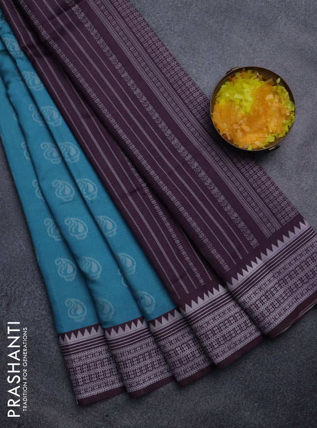 Sambalpuri semi silk saree light blue and wine shade with paisley butta weaves and thread woven border