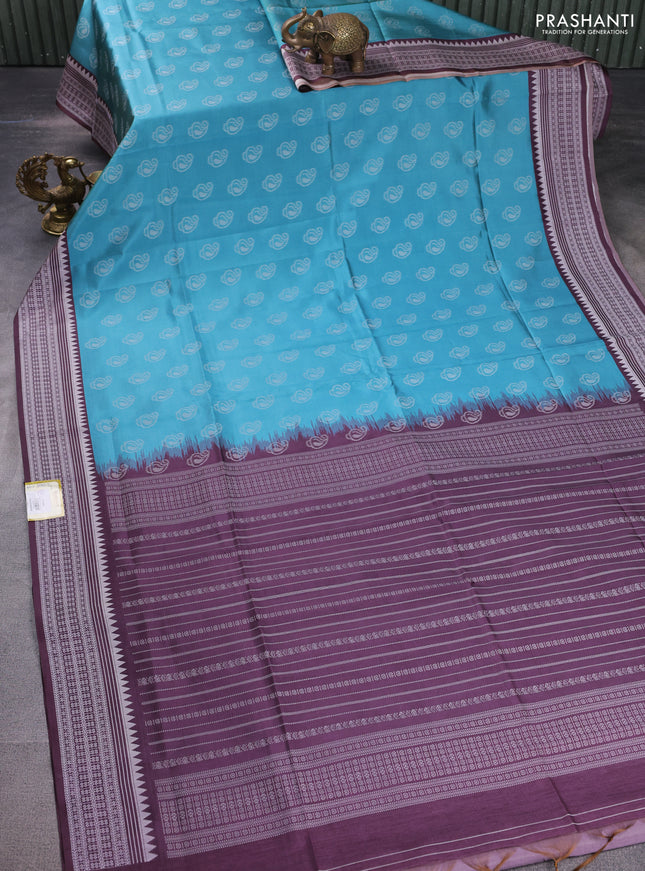 Sambalpuri semi silk saree light blue and wine shade with paisley butta weaves and thread woven border