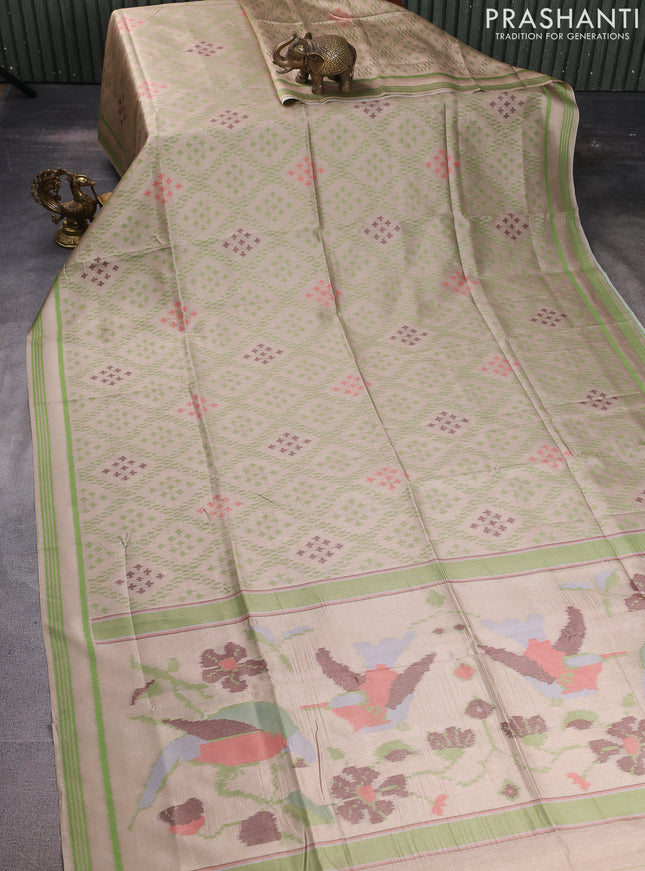 Sambalpuri semi silk saree sandal and light green with allover ikat weaves and rettapet thread woven border