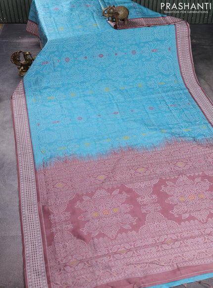 Sambalpuri semi silk saree light blue and brown with allover ikat weaves and thread woven border