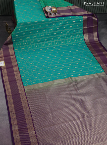Semi kanchipuram silk saree teal green and violet with allover zari checks & buttas and zari woven korvai border