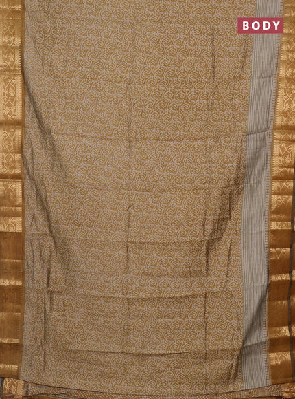 Semi maheshwari cotton saree yellow and beige with allover prints and zari woven border