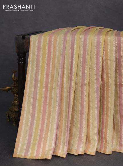 Munga silk saree multi colour and green with allover rangart weaves in borderless style