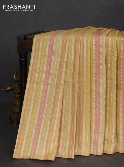 Munga silk saree multi colour and peach pink with allover rangart weaves in borderless style