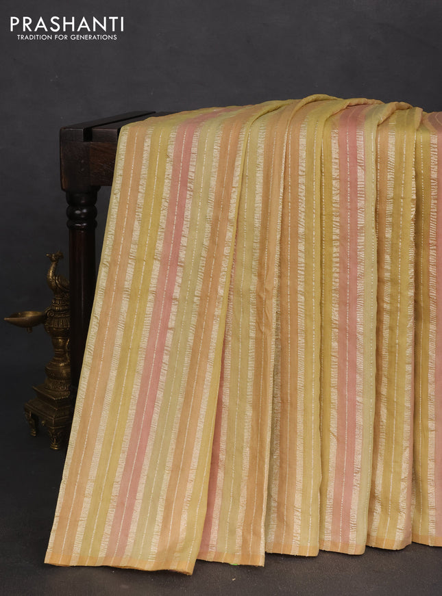 Munga silk saree multi colour and peach pink with allover rangart weaves in borderless style
