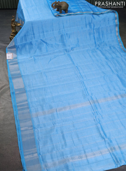 Mangalgiri silk cotton saree light blue and rustic orange with plain body and silver zari woven border