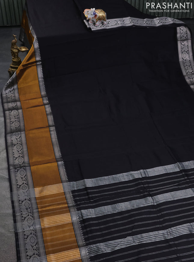 Mangalgiri silk cotton saree black and green with plain body and long rettapet silver zari woven border