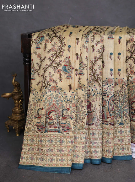 Tussar madhubani printed silk saree cream and peacock blue with allover prints and piping border