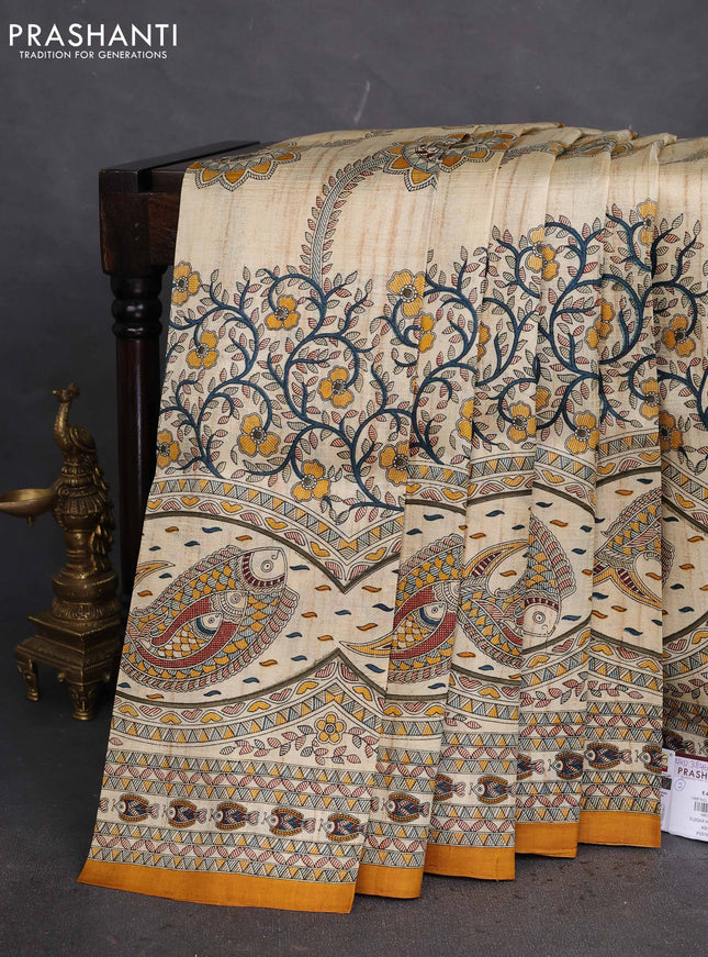 Tussar madhubani printed silk saree cream and mustard yellow with allover prints and piping border