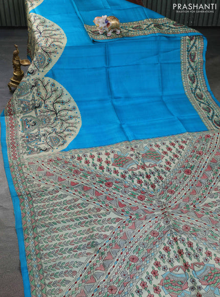 Tussar madhubani printed silk saree cs blue and cream with allover prints and printed border