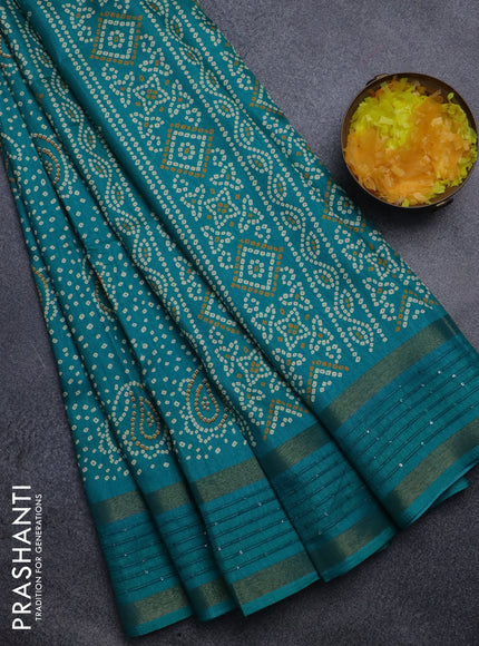 Semi dola saree teal green with allover bandhani prints and sequin work border