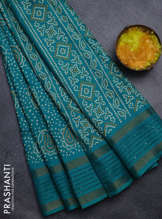 Semi dola saree teal green with allover bandhani prints and sequin work border