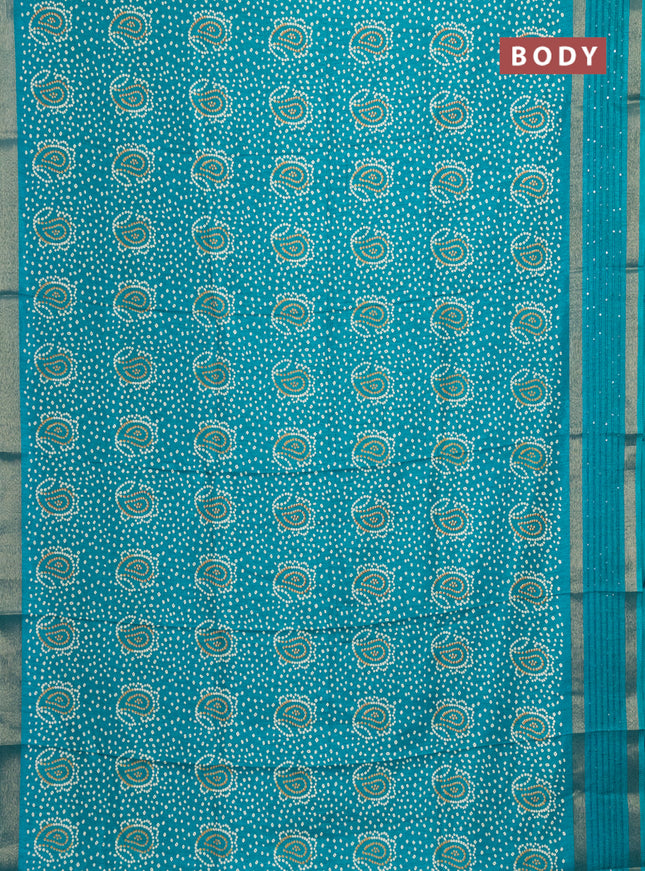 Semi dola saree teal green with allover bandhani prints and sequin work border