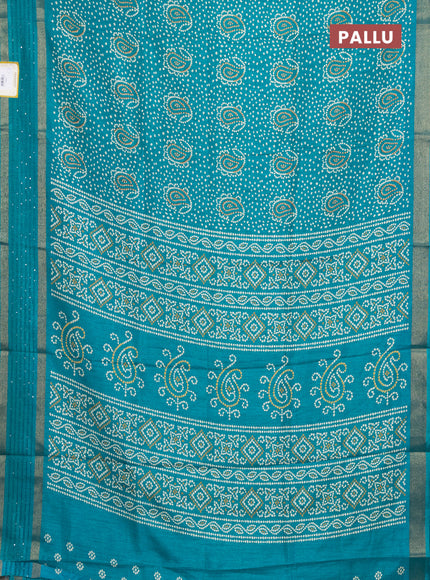 Semi dola saree teal green with allover bandhani prints and sequin work border
