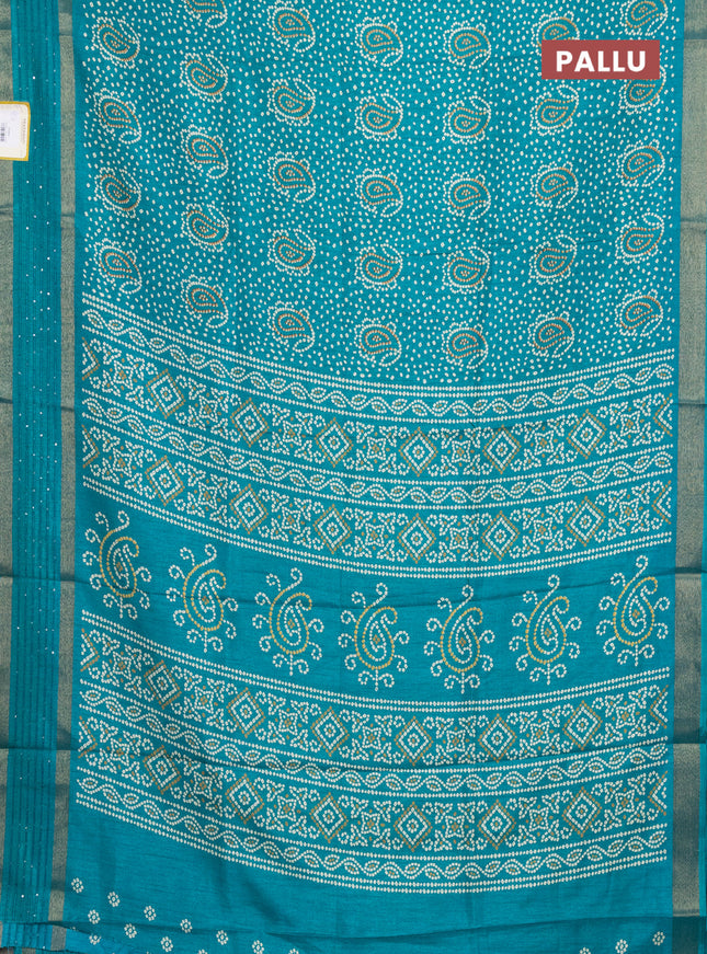 Semi dola saree teal green with allover bandhani prints and sequin work border