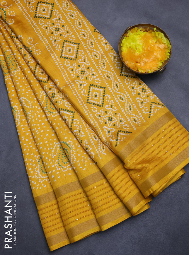 Semi dola saree mustard yellow with allover bandhani prints and sequin work border