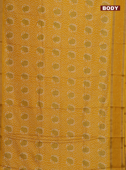 Semi dola saree mustard yellow with allover bandhani prints and sequin work border
