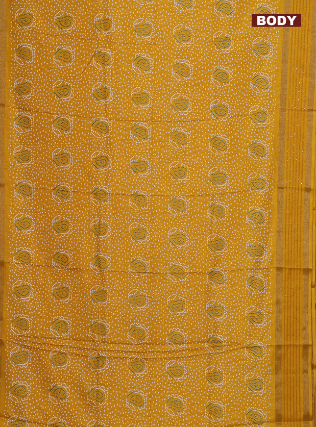 Semi dola saree mustard yellow with allover bandhani prints and sequin work border