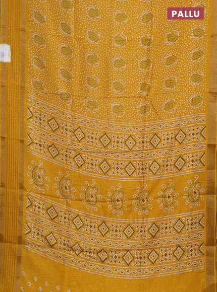 Semi dola saree mustard yellow with allover bandhani prints and sequin work border