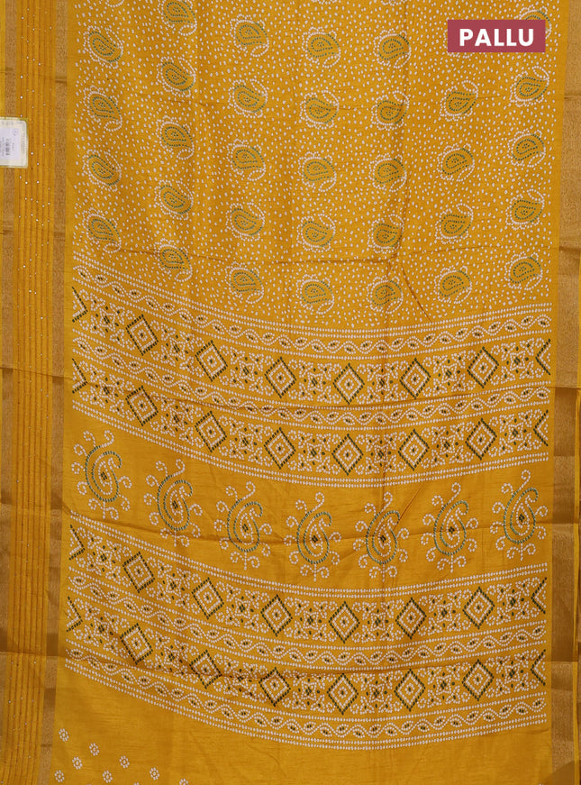 Semi dola saree mustard yellow with allover bandhani prints and sequin work border