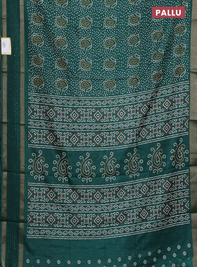 Semi dola saree green with allover bandhani prints and sequin work border