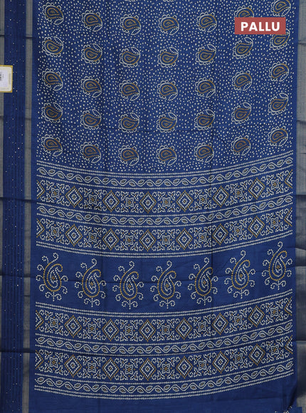 Semi dola saree peacock blue with allover bandhani prints and sequin work border
