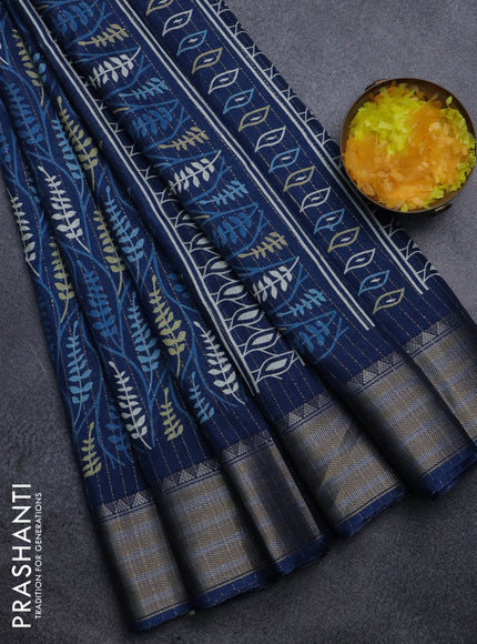 Semi dola saree peacock blue with allover zari weaves & leaf prints and zari woven border