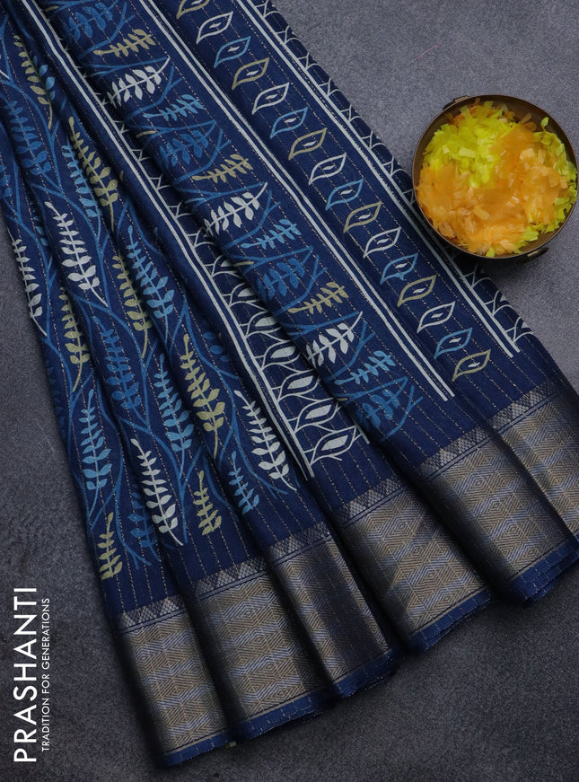 Semi dola saree peacock blue with allover zari weaves & leaf prints and zari woven border