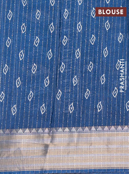 Semi dola saree peacock blue with allover zari weaves & leaf prints and zari woven border