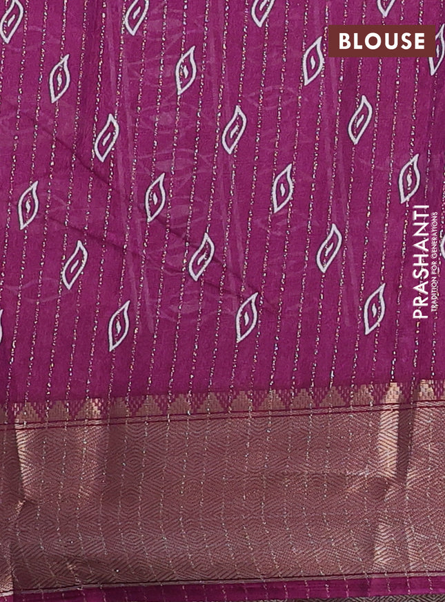 Semi dola saree purple shade with allover zari weaves & leaf prints and zari woven border
