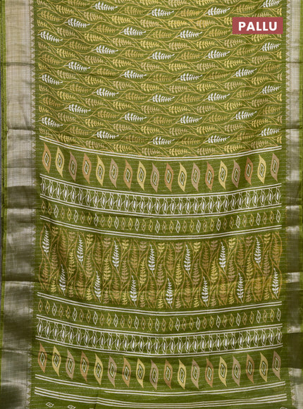 Semi dola saree light green with allover zari weaves & leaf prints and zari woven border