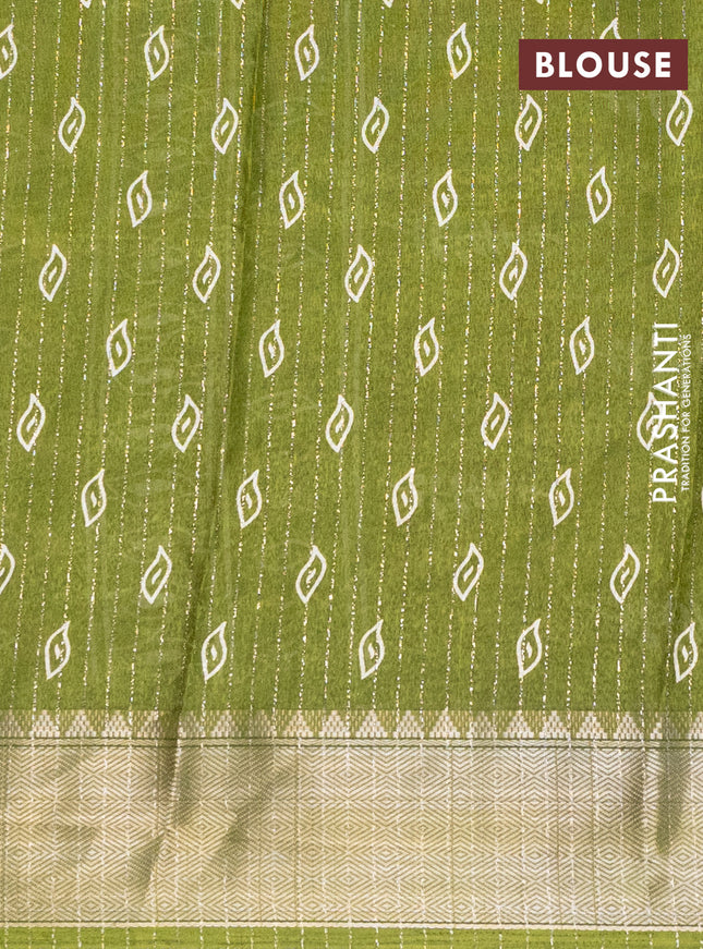 Semi dola saree light green with allover zari weaves & leaf prints and zari woven border