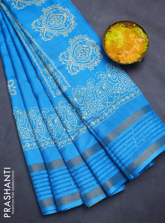 Semi dola saree cs blue with batik butta prints and sequin work border