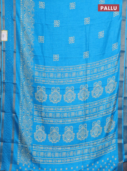 Semi dola saree cs blue with batik butta prints and sequin work border