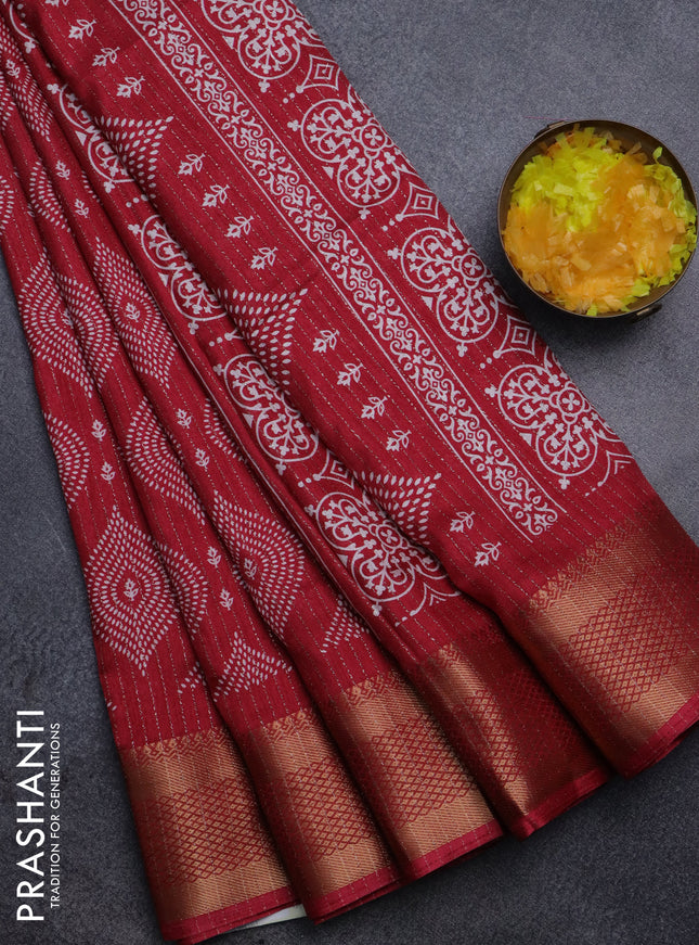 Semi dola saree maroon with allover zari weaves & prints and zari woven border