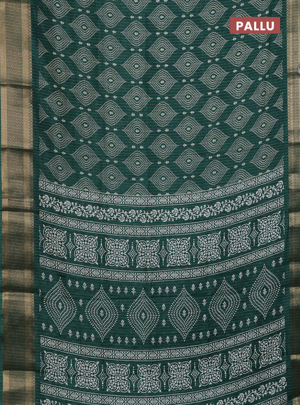 Semi dola saree dark green with allover zari weaves & prints and zari woven border