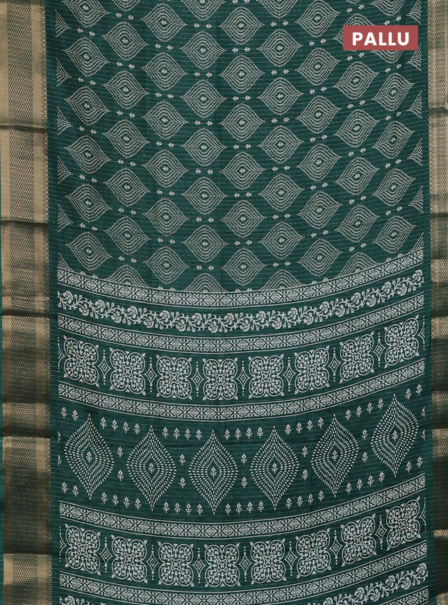 Semi dola saree dark green with allover zari weaves & prints and zari woven border