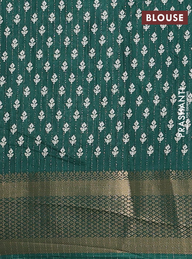 Semi dola saree dark green with allover zari weaves & prints and zari woven border