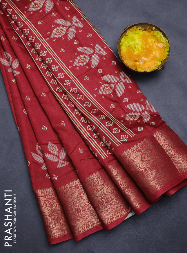 Semi dola saree maroon with butta prints and zari woven border