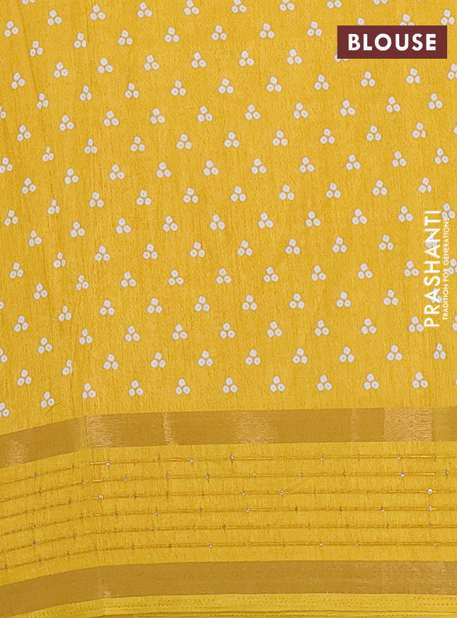 Semi dola saree yellow with allover bandhani prints and zari woven border