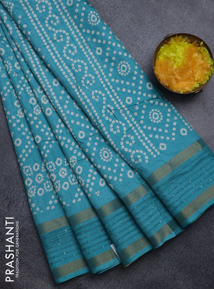 Semi dola saree teal blue with allover bandhani prints and zari woven border