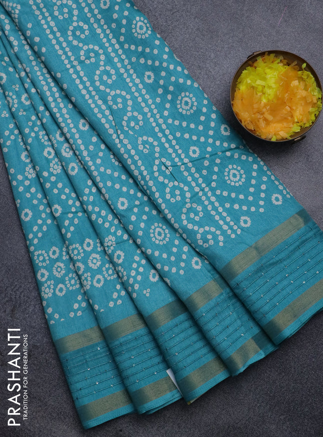 Semi dola saree teal blue with allover bandhani prints and zari woven border