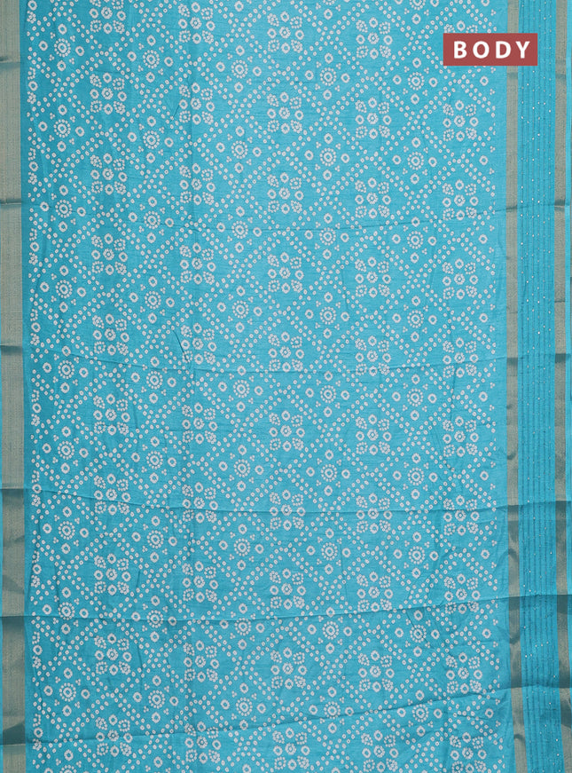 Semi dola saree teal blue with allover bandhani prints and zari woven border