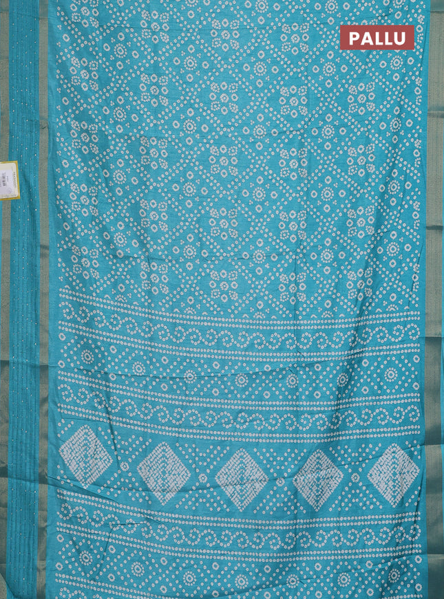 Semi dola saree teal blue with allover bandhani prints and zari woven border