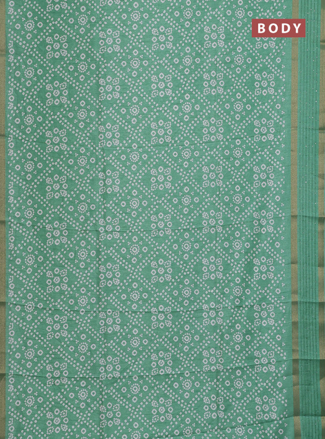 Semi dola saree pastel green with allover bandhani prints and zari woven border