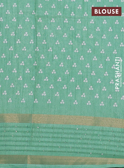 Semi dola saree pastel green with allover bandhani prints and zari woven border
